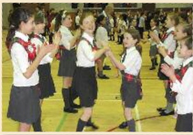 children dancing down the middle and back, photo from RSCDS Annual Review 2011